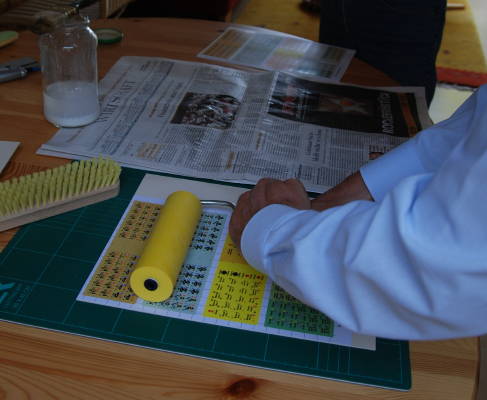 pressing with a rubber roller