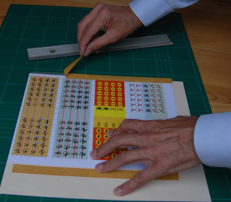 taping the counter sheet to the mat